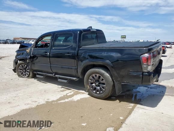 ✅ 2023 Toyota Tacoma Limited • VIN: 3TMGZ5ANXPM637772 • Лот: 63262695. Опубликован ранее на Copart с пробегом 18 352 миль. Бесплатный доступ к архиву аукционных продаж из США и подробный отчёт об истории автомобиля на DreamBid. Изображение 2.