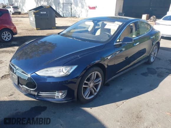 ✅ 2015 Tesla Model S 85 • VIN: 5YJSA1S1XFFP77006 • Lot: 43635423. Listed on IAAI with 94,297 mi. Free auction sales archive from the USA and detailed vehicle history report at DreamBid. Image 2.