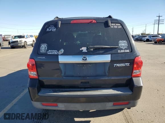 ✅ 2010 Mazda Tribute Touring • VIN: 4F2CY0C70AKM02556 • Lot: 82642245. Wystawiony na Copart z przebiegiem 140 851 mil. Bezpłatny archiwum sprzedaży aukcyjnych z USA i szczegółowy raport historii pojazdu na DreamBid. Zdjęcie 6.