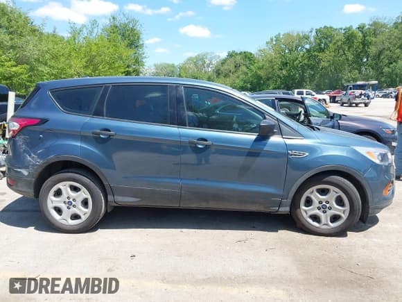 ✅ 2018 Ford Escape S • VIN: 1FMCU0F79JUA63979 • Lot: 42184819. Listed on IAAI with 125,720 mi. Free auction sales archive from the USA and detailed vehicle history report at DreamBid. Image 13.