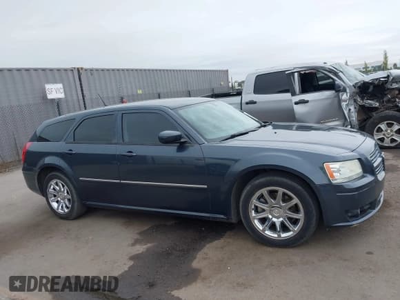 ✅ 2008 Dodge Magnum SXT • VIN: 2D4FV37V28H225805 • Lot: 43677320. Listed on IAAI with 228,019 mi. Free auction sales archive from the USA and detailed vehicle history report at DreamBid. Image 13.