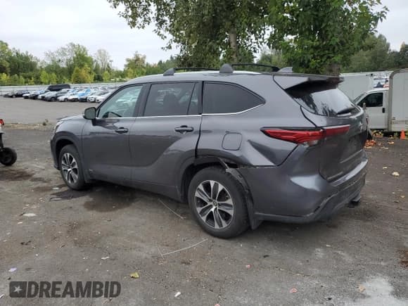 ✅ 2022 Toyota Highlander Hybrid XLE • VIN: 5TDHBRCH6NS540878 • Lot: 80414265. Listed on Copart with 76,899 mi. Free auction sales archive from the USA and detailed vehicle history report at DreamBid. Image 2.