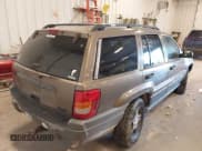 ✅ 2002 Jeep Grand Cherokee Laredo • VIN: 1J4GW48S82C110008 • Lot: 43538286. Listed on IAAI with 262,351 mi. Free auction sales archive from the USA and detailed vehicle history report at DreamBid. Image 4.