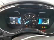 ✅ 2013 Ford Fusion Titanium Hybrid • VIN: 3FA6P0RU5DR368519 • Lot: 93022625. Wystawiony na Copart z przebiegiem 123 902 mil. Bezpłatny archiwum sprzedaży aukcyjnych z USA i szczegółowy raport historii pojazdu na DreamBid. Zdjęcie 9.