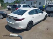 ✅ 2021 Mazda 3 Premium Plus • VIN: JM1BPBEYXM1311255 • Lot: 42819638. Listed on IAAI with 52,840 mi. Free auction sales archive from the USA and detailed vehicle history report at DreamBid. Image 4.