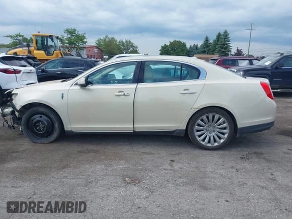 ✅ 2014 Lincoln MKS • VIN: 1LNHL9EK3EG602023 • Лот: 42830966. Опубликован ранее на IAAI с пробегом 91 033 миль. Бесплатный доступ к архиву аукционных продаж из США и подробный отчёт об истории автомобиля на DreamBid. Изображение 14.