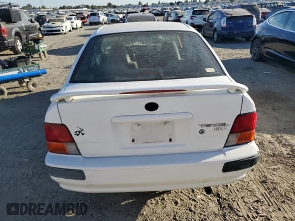 ✅ 1995 Toyota Tercel DX • VIN: JT2EL56D0S0108750 • Lot: 75322364. Listed on Copart with 200,116 mi. Free auction sales archive from the USA and detailed vehicle history report at DreamBid. Image 7.