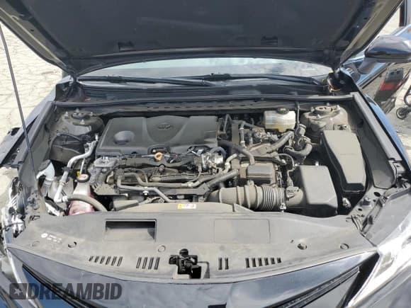 ✅ 2022 Toyota Camry Hybrid LE • VIN: 4T1C31AKXNU571369 • Lot: 83985115. Listed on Copart with 82,523 mi. Free auction sales archive from the USA and detailed vehicle history report at DreamBid. Image 11.