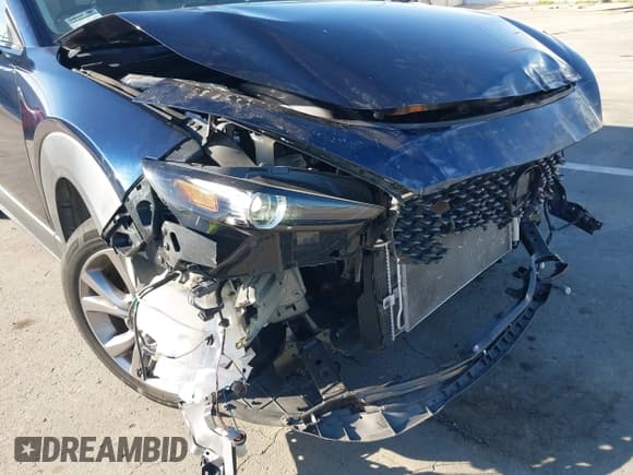 ✅ 2020 Mazda CX-30 Select • VIN: 3MVDMACLXLM101645 • Lot: 43662494. Listed on IAAI with 49,560 mi. Free auction sales archive from the USA and detailed vehicle history report at DreamBid. Image 6.