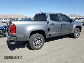 ✅ 2021 Chevrolet Colorado 2WD Work Truck • VIN: 1GCGSBEN2M1183393 • Лот: 75951524. Опубликован ранее на Copart с пробегом 27 752 миль. Бесплатный доступ к архиву аукционных продаж из США и подробный отчёт об истории автомобиля на DreamBid. Изображение 3.