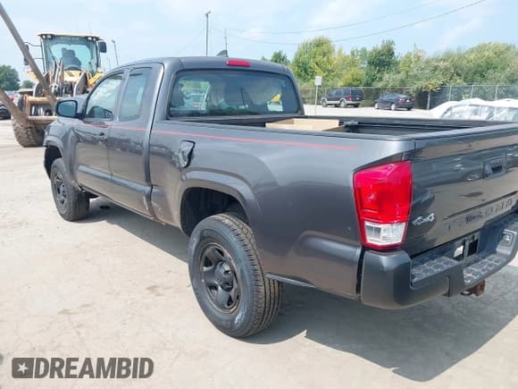 ✅ 2016 Toyota Tacoma SR • VIN: 5TFSX5EN0GX040537 • Lot: 43154855. Listed on IAAI with 79,779 mi. Free auction sales archive from the USA and detailed vehicle history report at DreamBid. Image 3.