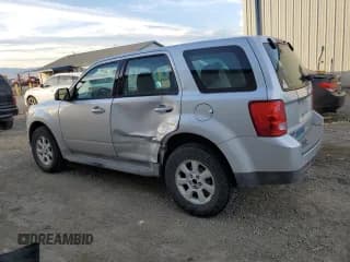 ✅ 2010 Mazda Tribute Sport • VIN: 4F2CY0C77AKM02764 • Лот: 75112623. Опубликован ранее на Copart с пробегом 147 590 миль. Бесплатный доступ к архиву аукционных продаж из США и подробный отчёт об истории автомобиля на DreamBid. Изображение 2.