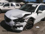 ✅ 2016 Mazda CX-5 Grand Touring • VIN: JM3KE2DY0G0695894 • Lot: 43441374. Wystawiony na IAAI z przebiegiem 112 838 mil. Bezpłatny archiwum sprzedaży aukcyjnych z USA i szczegółowy raport historii pojazdu na DreamBid. Zdjęcie 6.