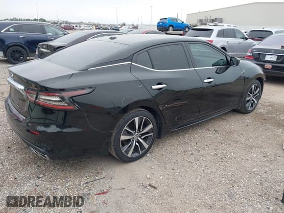 ✅ 2019 Nissan Maxima SL • VIN: 1N4AA6AV4KC380918 • Lot: 41267350. Wystawiony na IAAI z przebiegiem 97 206 mil. Bezpłatny archiwum sprzedaży aukcyjnych z USA i szczegółowy raport historii pojazdu na DreamBid. Zdjęcie 4.