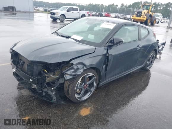 2019 Hyundai Veloster Turbo Ultimate z VIN KMHTH6AB5KU005677, wystawiony jako IAAI lot #42902553 z przebiegiem 96 790 mil mil oraz . Historia ofert i sprzedaży dostępna na DreamBid. Obrazek 2.