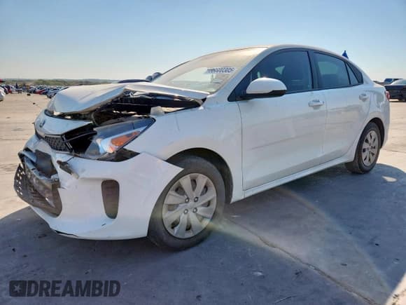 ✅ 2020 Kia Rio LX • VIN: 3KPA24AD8LE326552 • Лот: 86600305. Опубликован ранее на Copart с пробегом 107 099 миль. Бесплатный доступ к архиву аукционных продаж из США и подробный отчёт об истории автомобиля на DreamBid. Изображение 1.