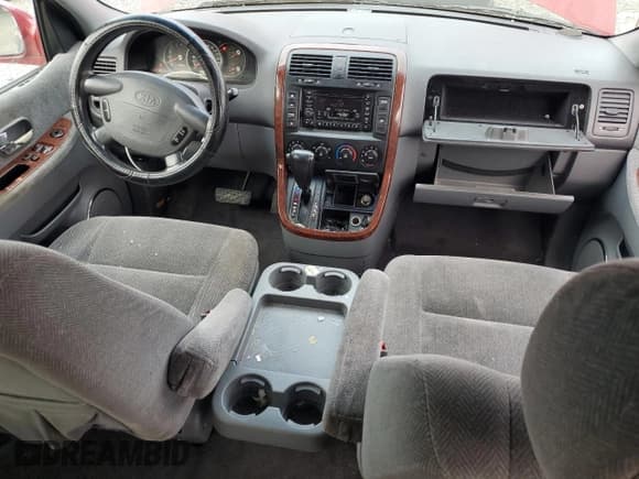 ✅ 2002 Kia Sedona LX • VIN: KNDUP131526222346 • Лот: 71923575. Опубликован ранее на Copart с пробегом 184 620 миль. Бесплатный доступ к архиву аукционных продаж из США и подробный отчёт об истории автомобиля на DreamBid. Изображение 8.