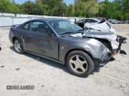 ✅ 2004 Ford Mustang Standard • VIN: 1FAFP40644F234703 • Lot: 55416345. Listed on Copart with 209,284 mi. Free auction sales archive from the USA and detailed vehicle history report at DreamBid. Image 4.