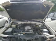 ✅ 2002 Lexus LX 470 • VIN: JTJHT00W523518148 • Lot: 73061974. Wystawiony na Copart z przebiegiem 273 355 mil. Bezpłatny archiwum sprzedaży aukcyjnych z USA i szczegółowy raport historii pojazdu na DreamBid. Zdjęcie 11.