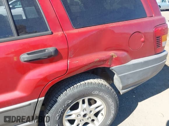 ✅ 2002 Jeep Grand Cherokee Laredo • VIN: 1J4GX48S62C257425 • Lot: 43435617. Listed on IAAI with 251,435 mi. Free auction sales archive from the USA and detailed vehicle history report at DreamBid. Image 6.