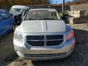 ✅ 2009 Dodge Caliber SXT • VIN: 1B3HB48A79D222768 • Лот: 90278195. Опубликован ранее на Copart с пробегом Не указан. Бесплатный доступ к архиву аукционных продаж из США и подробный отчёт об истории автомобиля на DreamBid. Изображение 5.