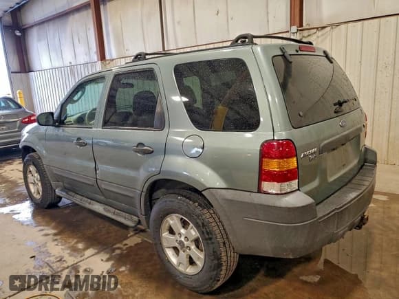 ✅ 2007 Ford Escape XLT • VIN: 1FMCU931X7KB61203 • Lot: 94150495. Listed on Copart with 113,385 mi. Free auction sales archive from the USA and detailed vehicle history report at DreamBid. Image 2.