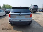 ✅ 2023 Honda Passport EX-L • VIN: 5FNYF8H50PB019594 • Lot: 42882366. Listed on IAAI with 26,120 mi. Free auction sales archive from the USA and detailed vehicle history report at DreamBid. Image 16.