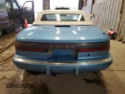 ✅ 1990 Buick Reatta • VIN: 1G4EC33C1LB903850 • Lot: 82066115. Listed on Copart with 81,355 mi. Free auction sales archive from the USA and detailed vehicle history report at DreamBid. Image 6.