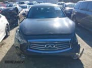 ✅ 2016 Infiniti QX70 • VIN: JN8CS1MW9GM752735 • Lot: 41271197. Listed on IAAI with 165,269 mi. Free auction sales archive from the USA and detailed vehicle history report at DreamBid. Image 12.