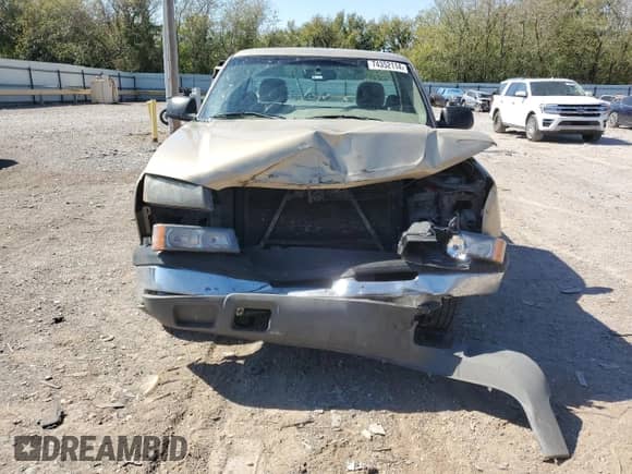 2004 Chevrolet Silverado 1500 LS z VIN 1GCEC14V54Z118877, wystawiony jako Copart lot #74352114 z przebiegiem 103 253 mil mil oraz Szkoda całkowita • Salvage title. Historia ofert i sprzedaży dostępna na DreamBid. Obrazek 5.