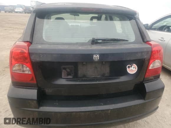 2007 Dodge Caliber z VIN 1B3HB28BX7D139054, wystawiony jako Copart lot #76559914 z przebiegiem 119 975 mil mil oraz Szkoda całkowita • Salvage title. Historia ofert i sprzedaży dostępna na DreamBid. Obrazek 6.