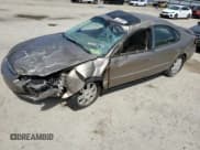 ✅ 2003 Ford Taurus SEL Deluxe • VIN: 1FAHP56S33A105091 • Лот: 70198565. Опубликован ранее на Copart с пробегом 219 568 миль. Бесплатный доступ к архиву аукционных продаж из США и подробный отчёт об истории автомобиля на DreamBid. Изображение 1.