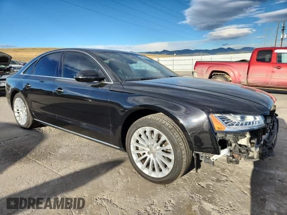 ✅ 2015 Audi A8 • VIN: WAUJGAFDXFN030468 • Lot: 86258435. Listed on Copart with 121,889 mi. Free auction sales archive from the USA and detailed vehicle history report at DreamBid. Image 4.