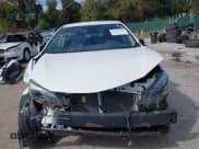 ✅ 2018 Toyota Corolla L • VIN: 2T1BURHE7JC083256 • Lot: 43449525. Listed on IAAI with 71,427 mi. Free auction sales archive from the USA and detailed vehicle history report at DreamBid. Image 13.