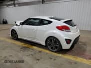 ✅ 2016 Hyundai Veloster Turbo • VIN: KMHTC6AE2GU250680 • Lot: 81348314. Wystawiony na Copart z przebiegiem 124 897 mil. Bezpłatny archiwum sprzedaży aukcyjnych z USA i szczegółowy raport historii pojazdu na DreamBid. Zdjęcie 2.