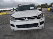 ✅ 2014 Volkswagen Touareg Sport • VIN: WVGEF9BPXED005205 • Lot: 43170166. Listed on IAAI with 114,284 mi. Free auction sales archive from the USA and detailed vehicle history report at DreamBid. Image 12.