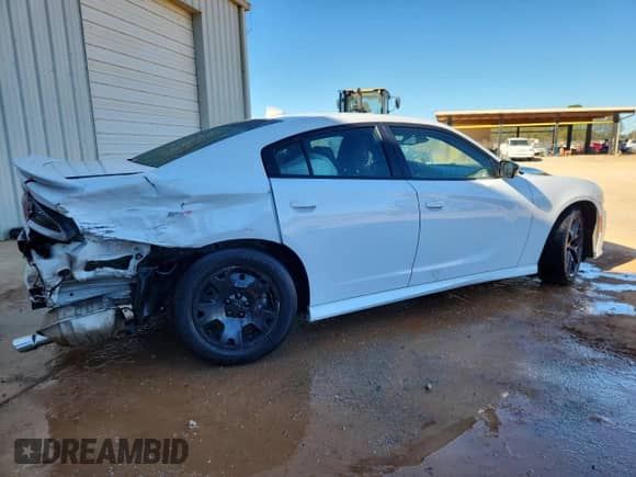 2023 Dodge Charger GT с VIN 2C3CDXHG9PH554496, выставлен на аукционе Copart как лот 85870135 с пробегом 84 818 миль миль и Чистый • Clean title. История ставок и продаж доступна на DreamBid. Изображение 3.