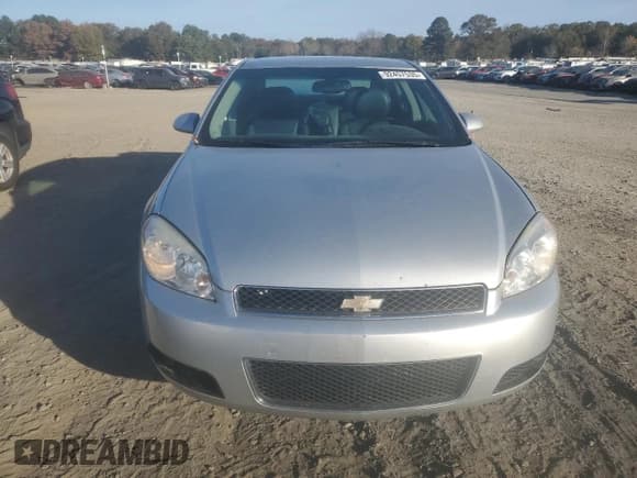 ✅ 2014 Chevrolet Impala LTZ • VIN: 2G1WC5E38E1164683 • Lot: 92457535. Listed on Copart with 250,186 mi. Free auction sales archive from the USA and detailed vehicle history report at DreamBid. Image 5.