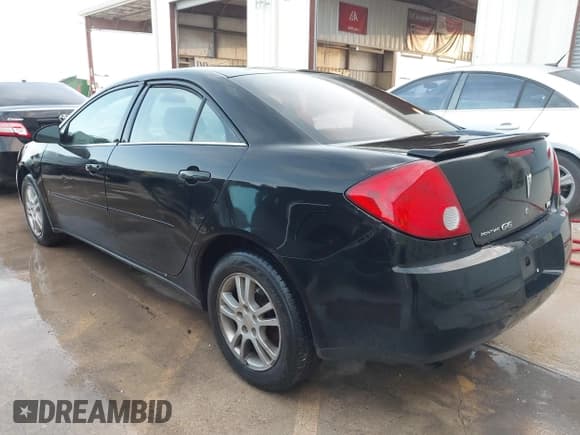 ✅ 2006 Pontiac G6 6-Cyl • VIN: 1G2ZG558264252742 • Lot: 42647619. Listed on IAAI with 214,525 mi. Free auction sales archive from the USA and detailed vehicle history report at DreamBid. Image 3.