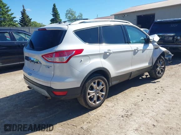 ✅ 2015 Ford Escape Titanium • VIN: 1FMCU9J9XFUA35967 • Lot: 42342432. Listed on IAAI with 160,442 mi. Free auction sales archive from the USA and detailed vehicle history report at DreamBid. Image 4.