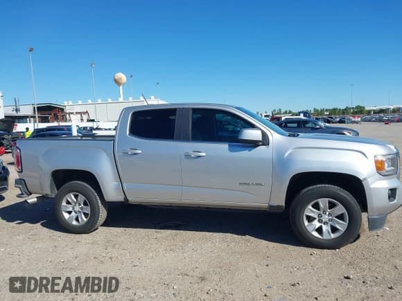 ✅ 2016 GMC Canyon 2WD SLE • VIN: 1GTG5CE30G1219887 • Lot: 43607076. Listed on IAAI with 147,453 mi. Free auction sales archive from the USA and detailed vehicle history report at DreamBid. Image 13.