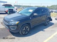 ✅ 2017 Jeep Compass Trailhawk • VIN: 3C4NJDDB7HT651906 • Lot: 43252109. Listed on IAAI with 76,217 mi. Free auction sales archive from the USA and detailed vehicle history report at DreamBid. Image 2.