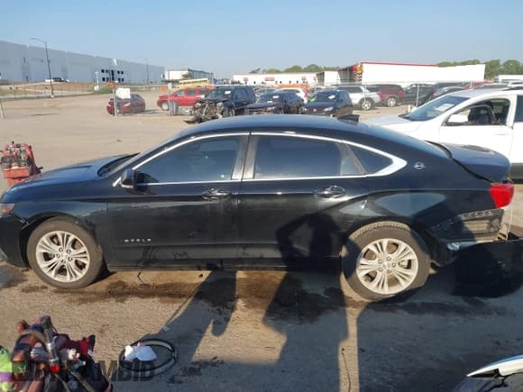 ✅ 2015 Chevrolet Impala LT • VIN: 2G1125S35F9213438 • Lot: 43168435. Listed on IAAI with 217,381 mi. Free auction sales archive from the USA and detailed vehicle history report at DreamBid. Image 14.