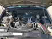 2004 Chevrolet Blazer LS с VIN 1GNDT13X24K162124, выставлен на аукционе Copart как лот 69428095 с пробегом Не указан миль и Списание • Salvage title. История ставок и продаж доступна на DreamBid. Изображение 11.