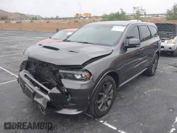 2018 Dodge Durango R/T with VIN 1C4SDHCT8JC100591, listed as a IAAI auction lot 43296025 with 95,326 mi miles and . Bid and sale history available at DreamBid. Image 2.