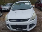 ✅ 2013 Ford Escape SE • VIN: 1FMCU0GX9DUB25741 • Lot: 43670150. Wystawiony na IAAI z przebiegiem 188 545 mil. Bezpłatny archiwum sprzedaży aukcyjnych z USA i szczegółowy raport historii pojazdu na DreamBid. Zdjęcie 6.