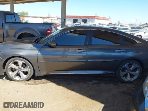 ✅ 2020 Honda Accord Touring • VIN: 1HGCV2F90LA007580 • Lot: 42760290. Listed on IAAI with 129,631 mi. Free auction sales archive from the USA and detailed vehicle history report at DreamBid. Image 13.