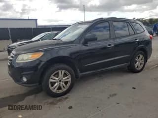 ✅ 2012 Hyundai Santa Fe Limited • VIN: 5XYZK3AB8CG125653 • Lot: 81908775. Listed on Copart with 209,217 mi. Free auction sales archive from the USA and detailed vehicle history report at DreamBid. Image 1.