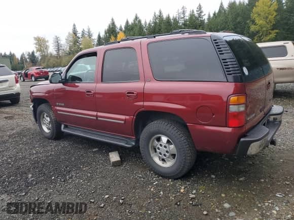 2002 Chevrolet Tahoe LT with VIN 1GNEK13Z12J247516, listed as a Copart auction lot 87127595 with 214,854 mi miles and Salvage title. Bid and sale history available at DreamBid. Image 2.