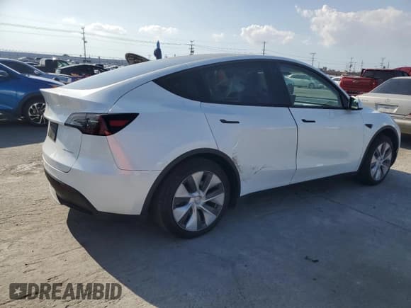 ✅ 2023 Tesla Model Y Long Range • VIN: 7SAYGDEE9PA118473 • Lot: 89553285. Listed on Copart with 25,093 mi. Free auction sales archive from the USA and detailed vehicle history report at DreamBid. Image 3.